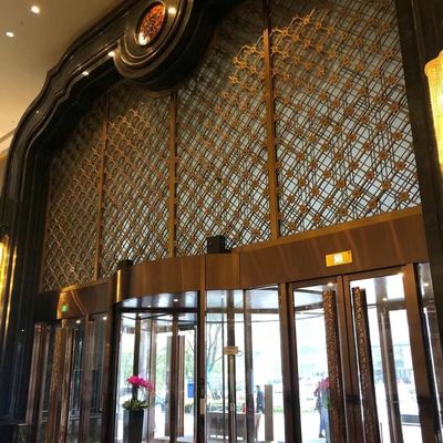 Divisorio piegante su ordinazione del salone dell'ingresso della mobilia dell'hotel di acciaio inossidabile di struttura dello schermo