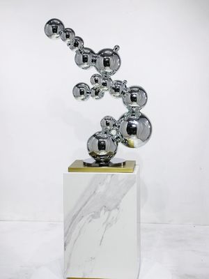 Scultura di bolla di metallo di qualità moderna con finitura specchiata Console di angolo dell'hotel